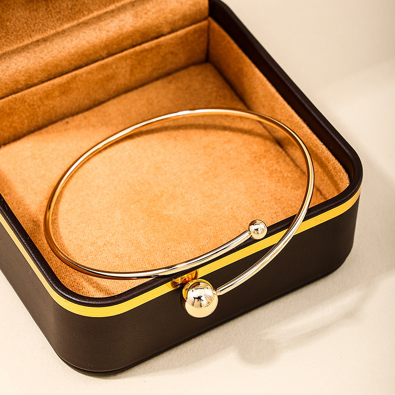 "Chic & Sleek: Gold & Silver Bracelets to Adorn Your Wrist"